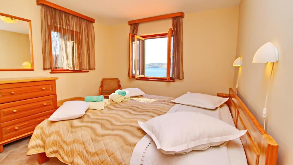 Posteľ alebo postele v izbe v ubytovaní Vacation House Katica