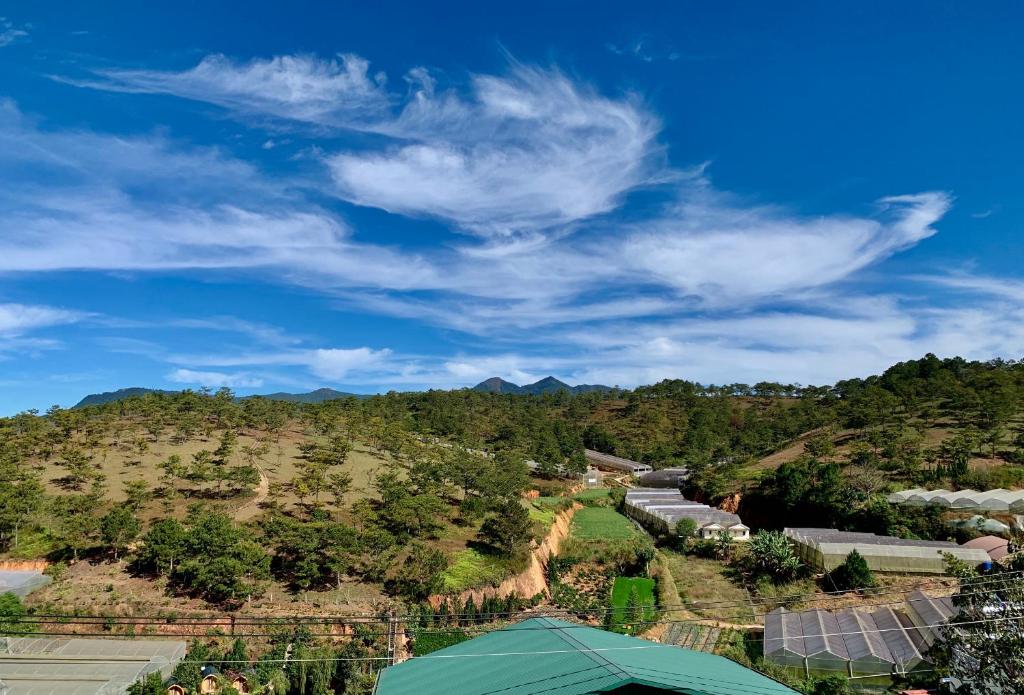 a view of a hill with trees and a blue sky at Villa Délight House “Stay&Chill” in Da Lat