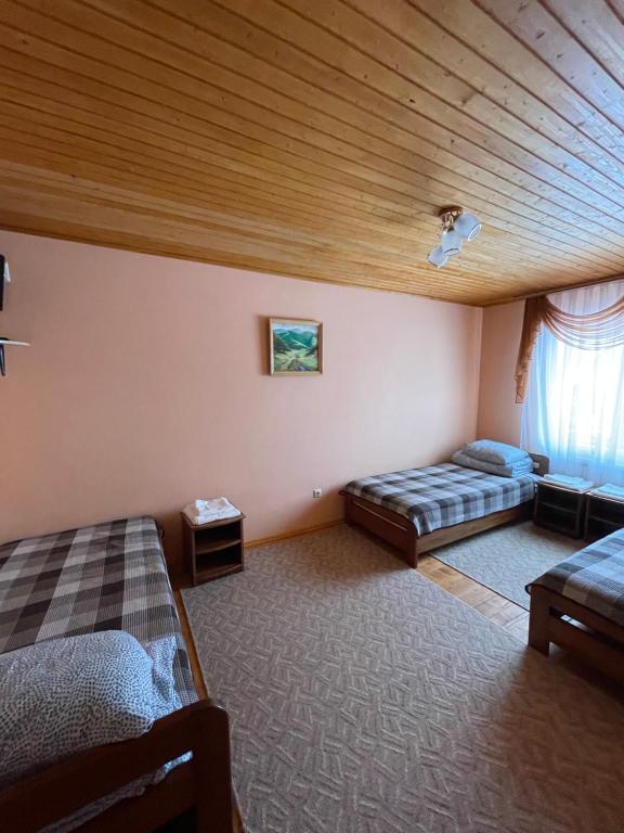Katil atau katil-katil dalam bilik di Горизонт