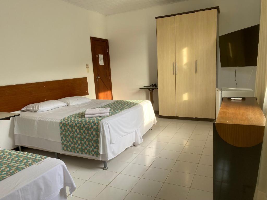 Postel nebo postele na pokoji v ubytování Valparaiso Hotel