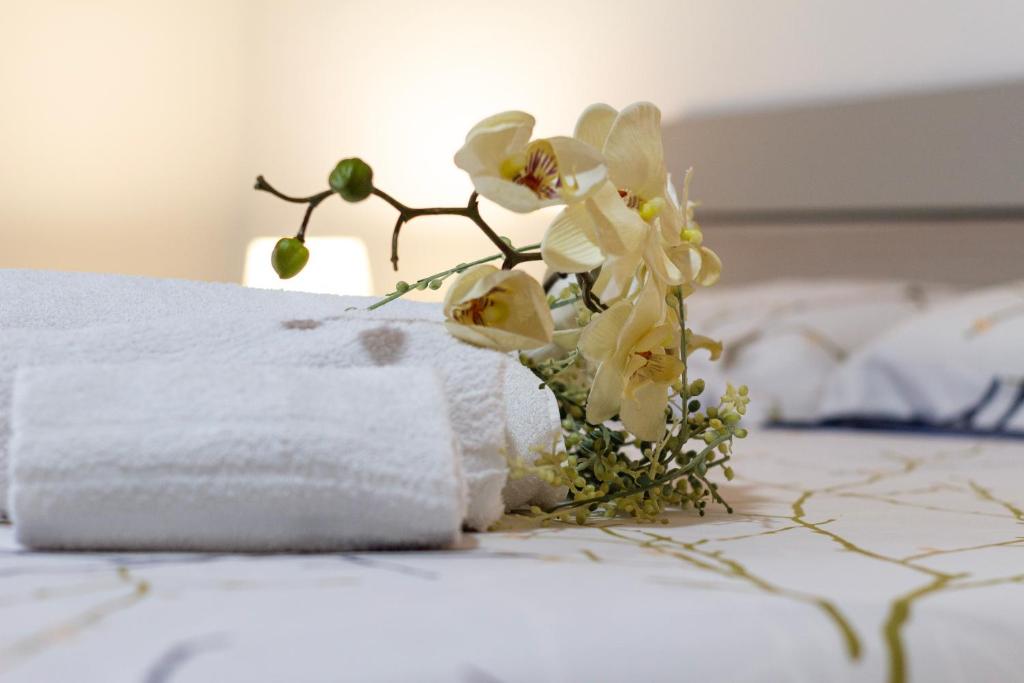 Postel nebo postele na pokoji v ubytování B&B Continanza