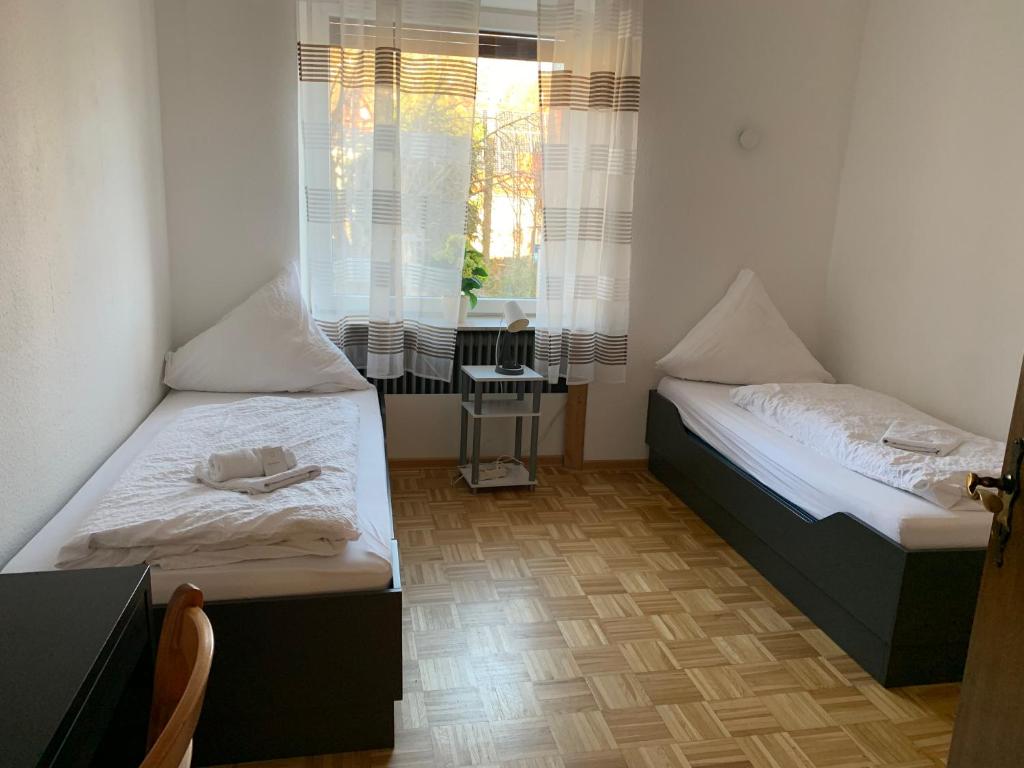 Ein Bett oder Betten in einem Zimmer der Unterkunft Landgasthaus Klosterhof