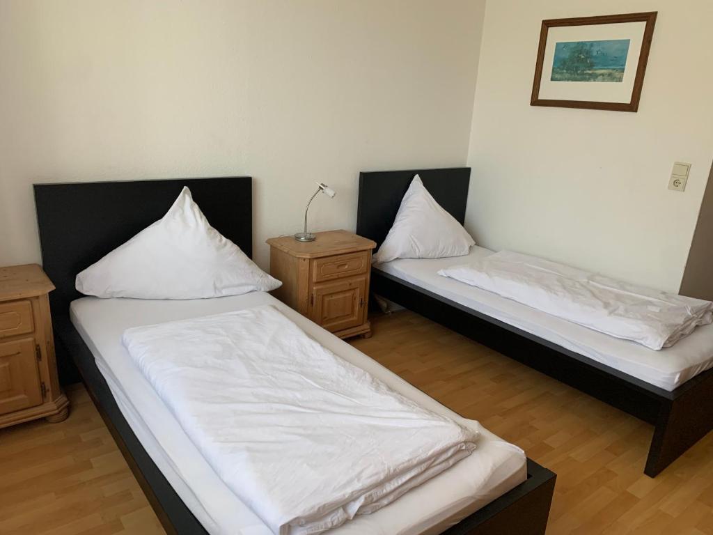 Ein Bett oder Betten in einem Zimmer der Unterkunft Landgasthaus Klosterhof