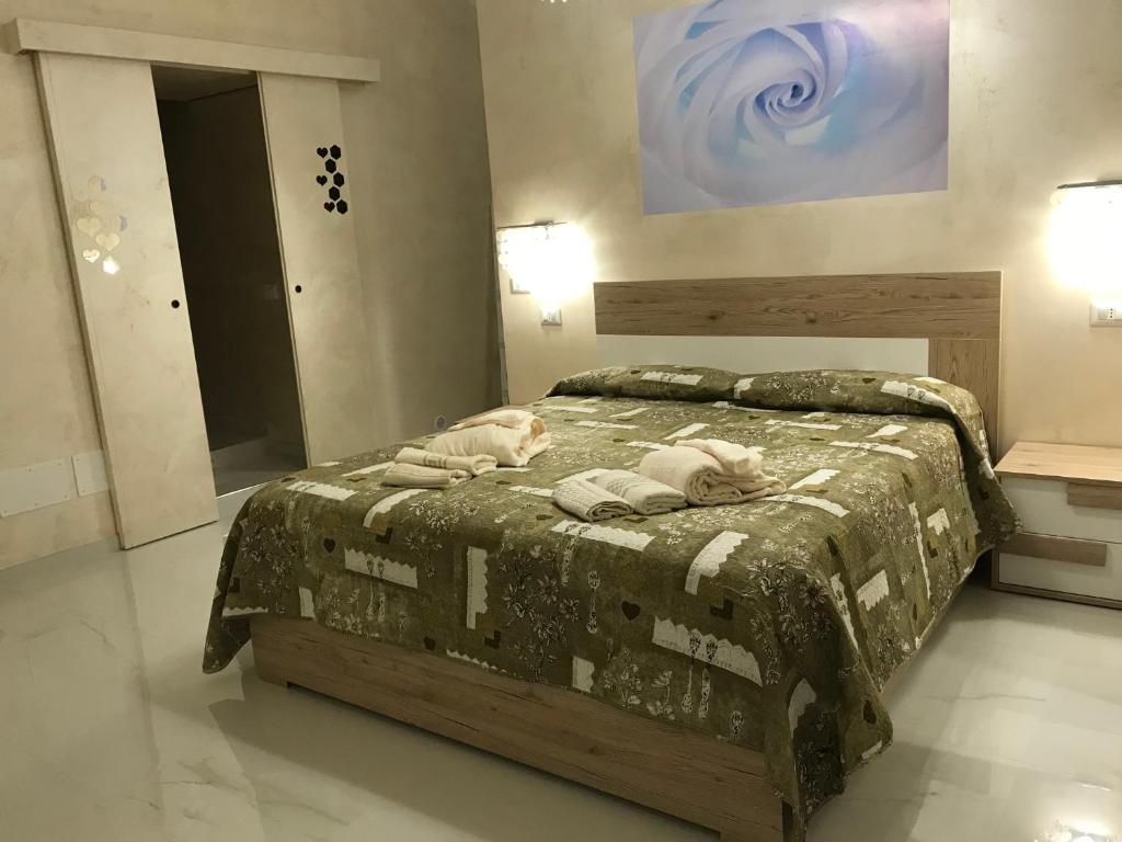 Postel nebo postele na pokoji v ubytování La Stella d'oro