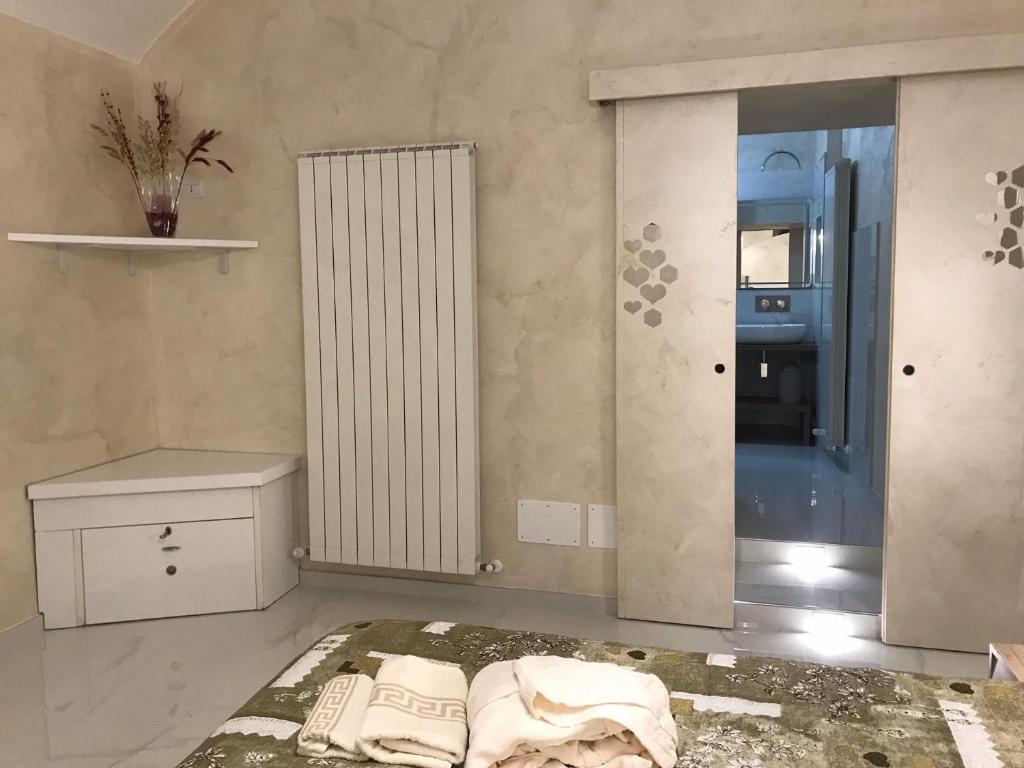 Postel nebo postele na pokoji v ubytování La Stella d'oro