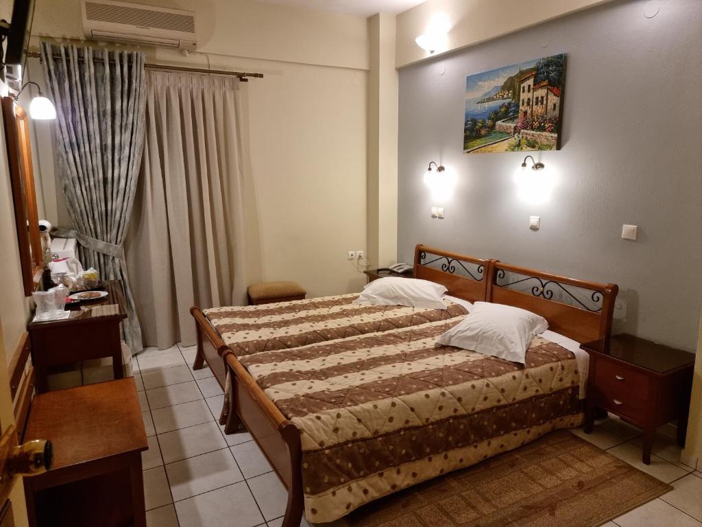 Posteľ alebo postele v izbe v ubytovaní Pitho