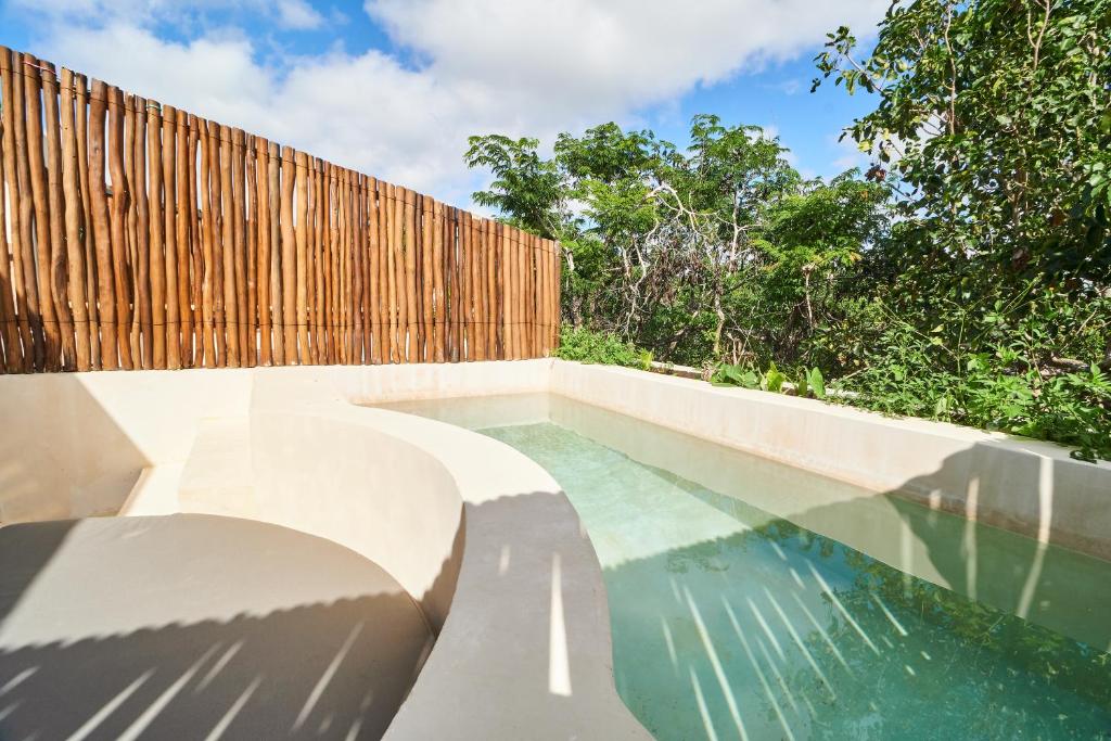 A piscina localizada em Ecochic Tulum Vibe PentHouse with Private Pool in Aldea Zama Exclusive Gated Community ou nos arredores