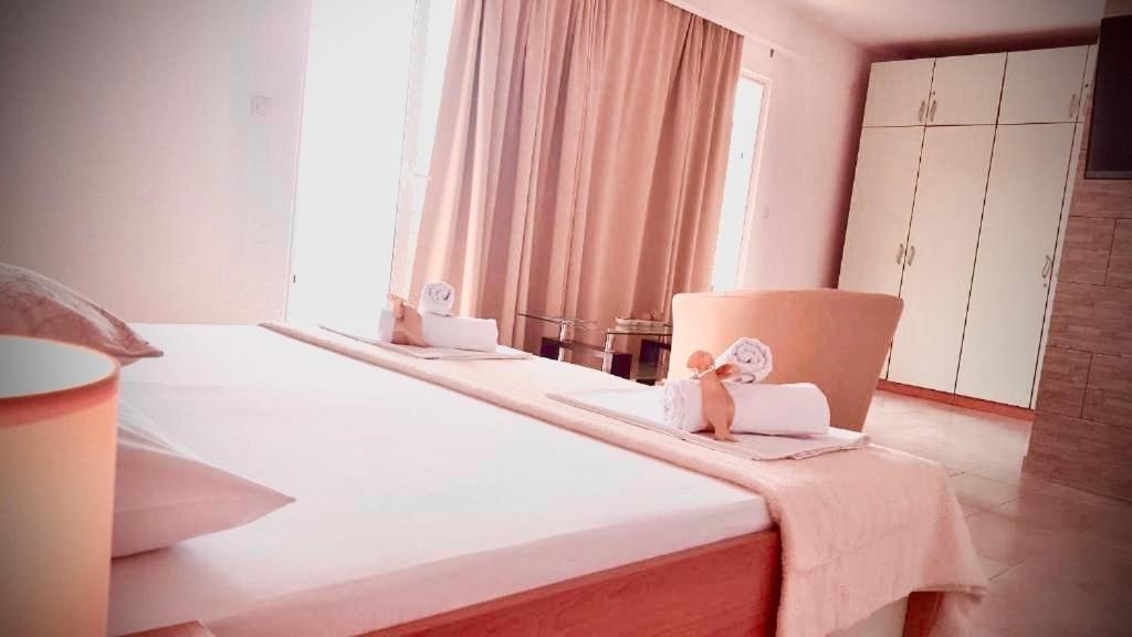 Postel nebo postele na pokoji v ubytování Rooms Florida