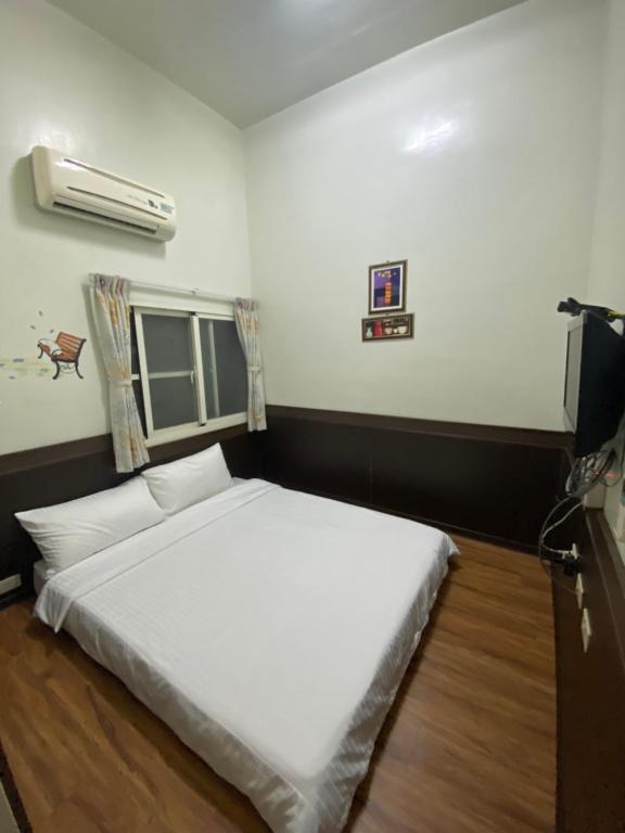 Postel nebo postele na pokoji v ubytování Danke Hostel