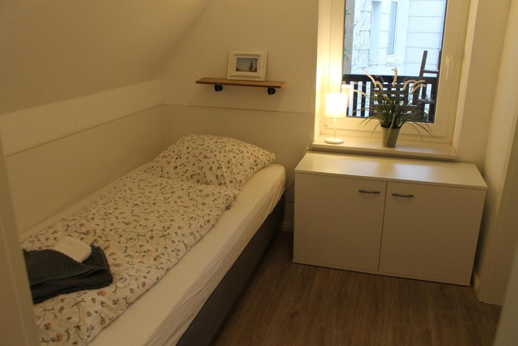 Postel nebo postele na pokoji v ubytování Apartment am Wall