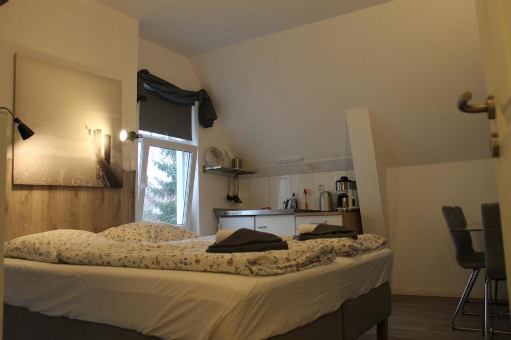 Postel nebo postele na pokoji v ubytování Apartment am Wall