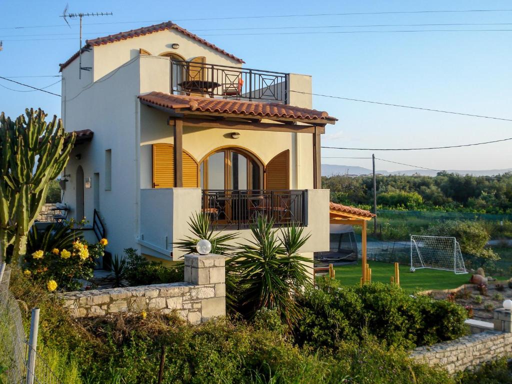 a villa with a view of a soccer field at Summer Home of Skaleta beach in Skaleta