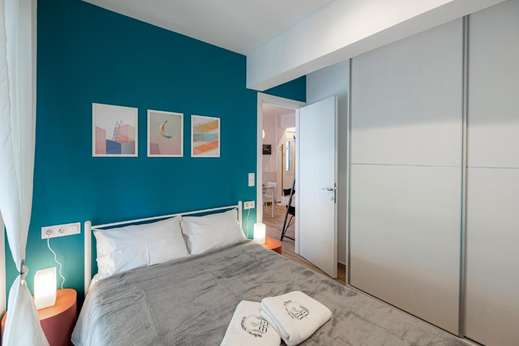 Łóżko lub łóżka w pokoju w obiekcie Aphrodite Apartment