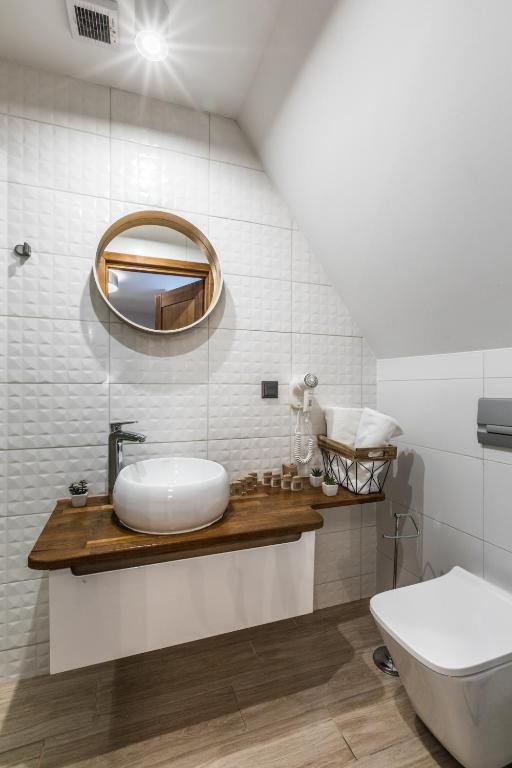 Kúpeľňa v ubytovaní Apartamenty ForRest Nowotarska