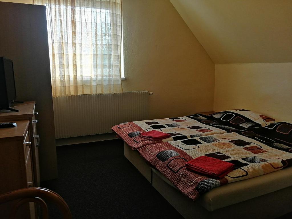 Łóżko lub łóżka w pokoju w obiekcie Privat Bohemia