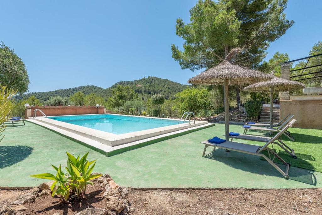 The swimming pool at or close to Finca Bosc de Can Alou by Mallorca House Rent