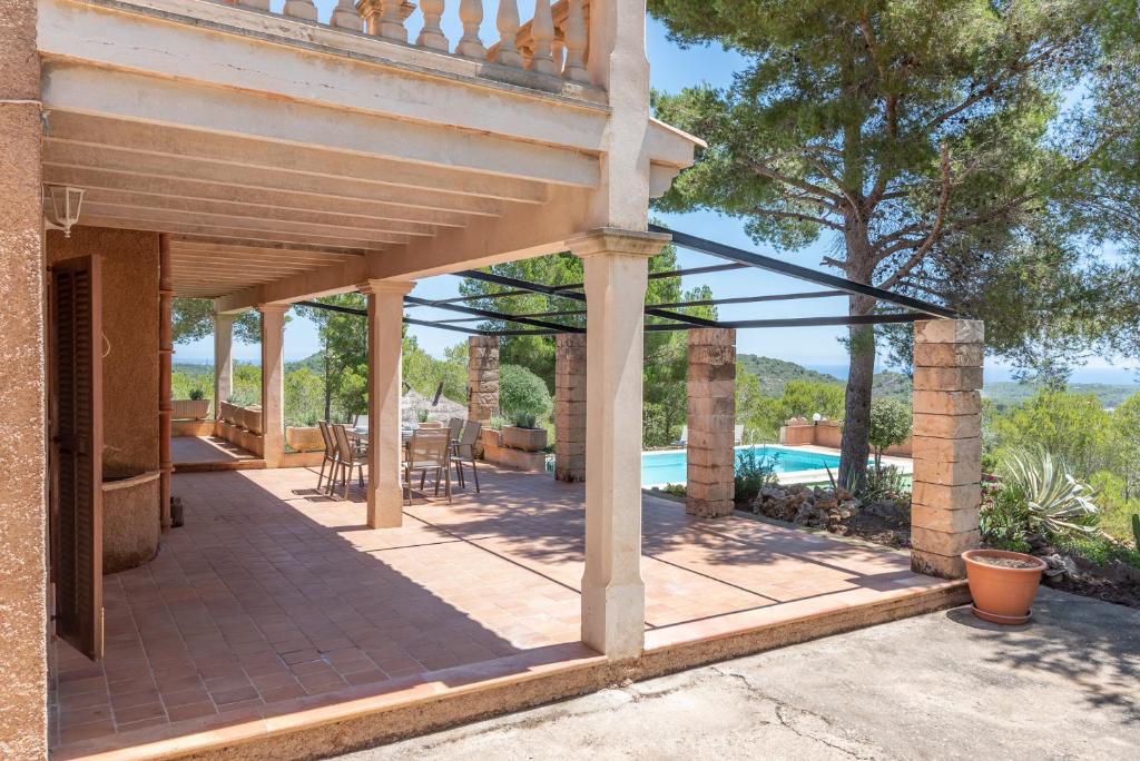 A balcony or terrace at Finca Bosc de Can Alou by Mallorca House Rent