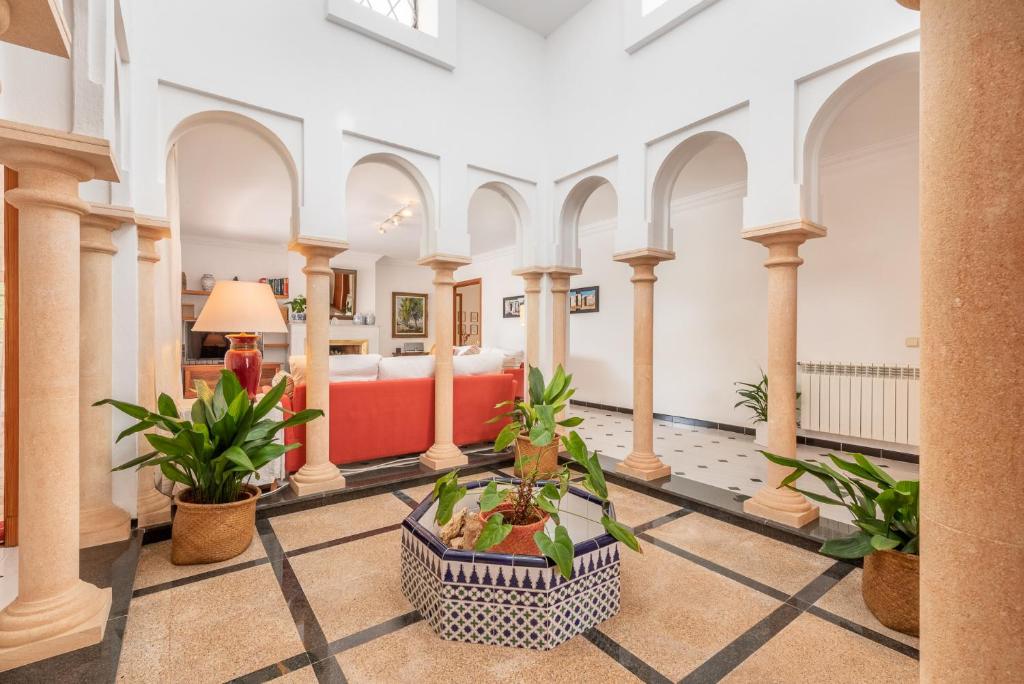 Posezení v ubytování Villa Sa Punta des Far