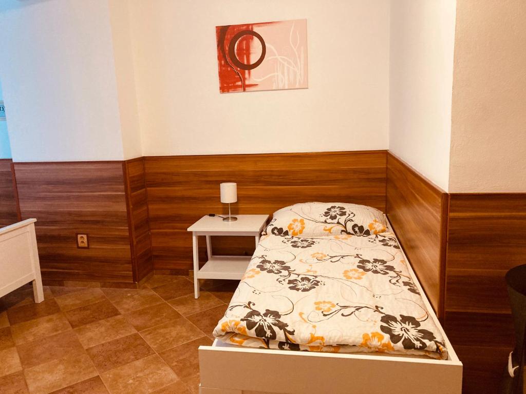 Postel nebo postele na pokoji v ubytování Penzion U Horských