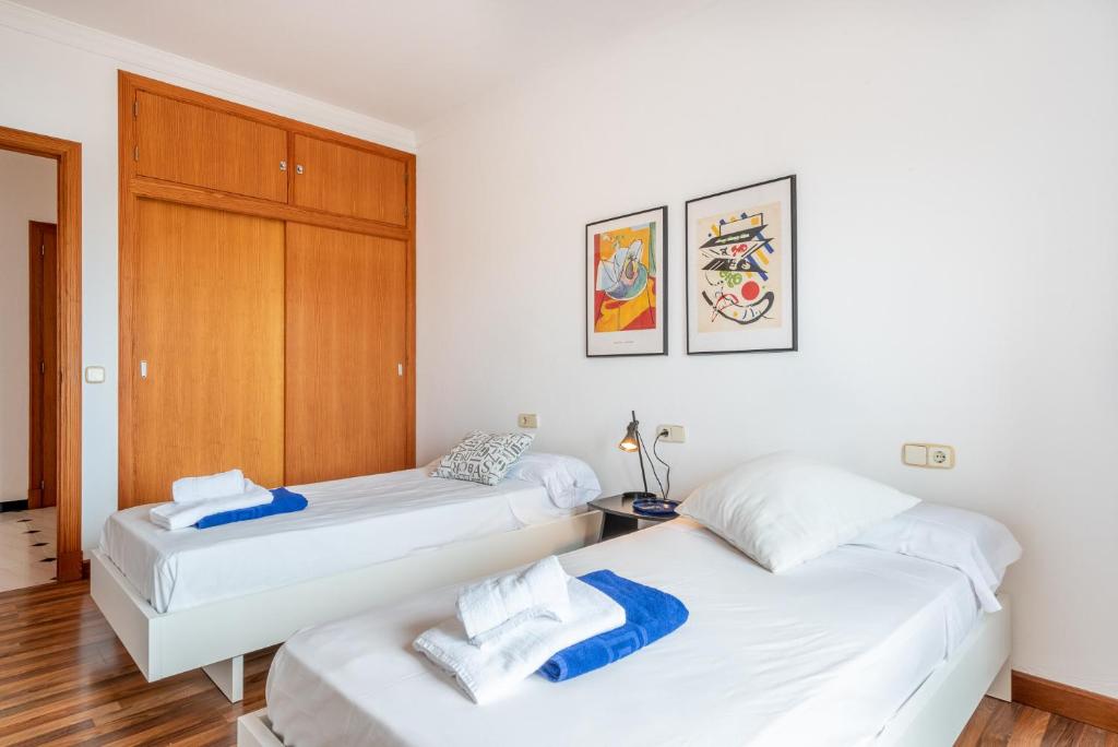 Postel nebo postele na pokoji v ubytování Villa Sa Punta des Far
