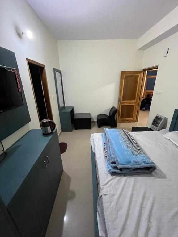 TV a/nebo společenská místnost v ubytování Ranas B&B