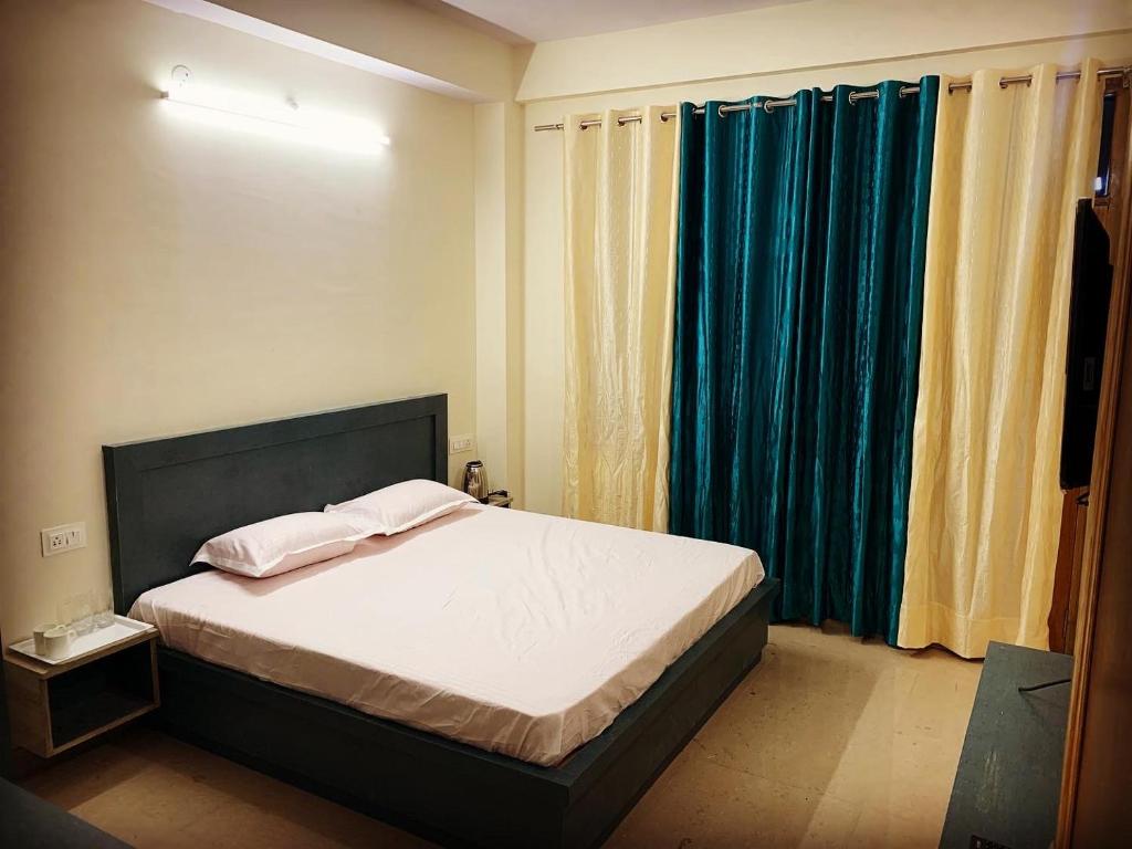 Postel nebo postele na pokoji v ubytování Ranas B&B