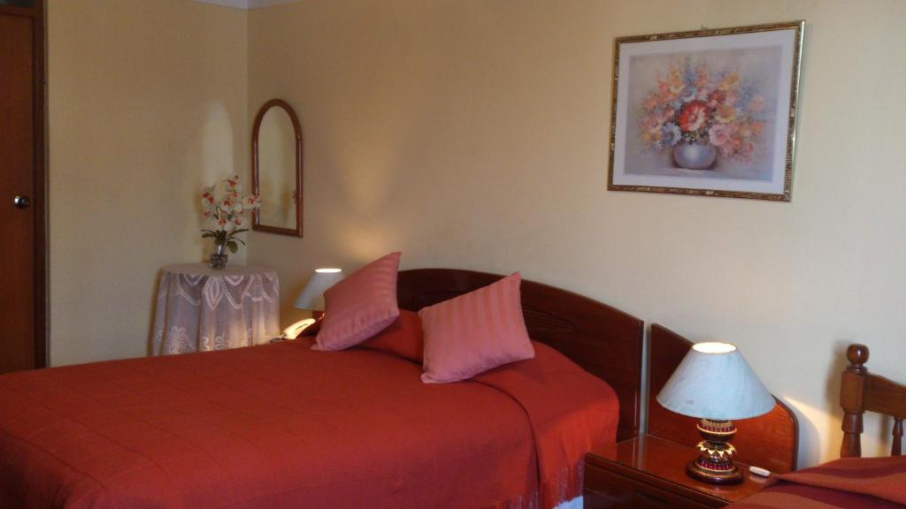 Postel nebo postele na pokoji v ubytování Copacabana Hotel