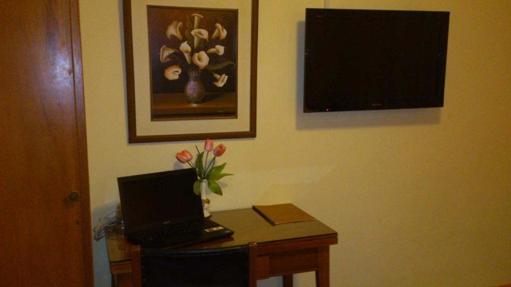 TV a/nebo společenská místnost v ubytování Copacabana Hotel