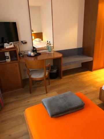 Postel nebo postele na pokoji v ubytování Seminar- und Urlaubshotel Schulz