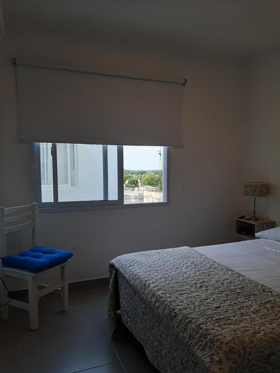 Postel nebo postele na pokoji v ubytování Hospedaje Departamentos Costa del Uruguay
