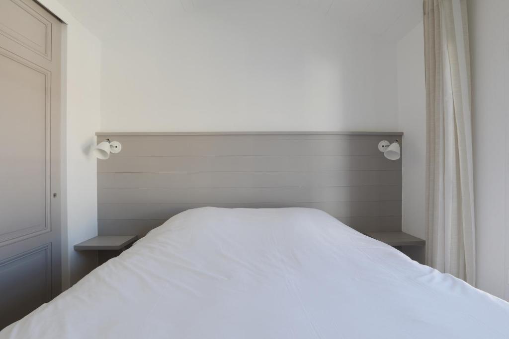 Cama o camas de una habitación en Joli appartement avec magnifique vue