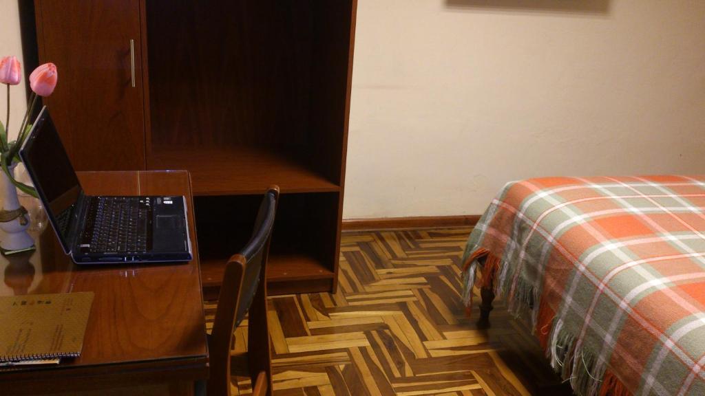 TV a/nebo společenská místnost v ubytování Copacabana Hotel