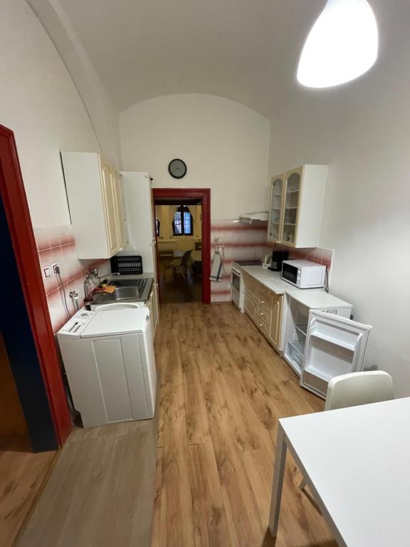 Kuchyň nebo kuchyňský kout v ubytování Apartment Jackie