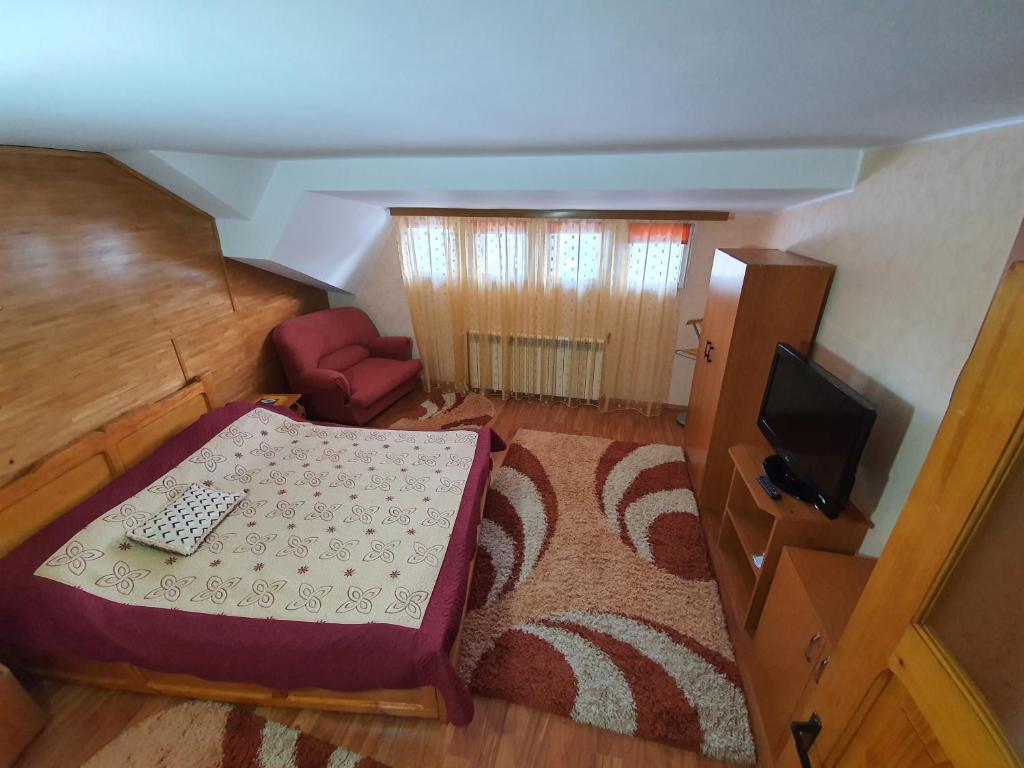 Postel nebo postele na pokoji v ubytování Vila Maya Predeal