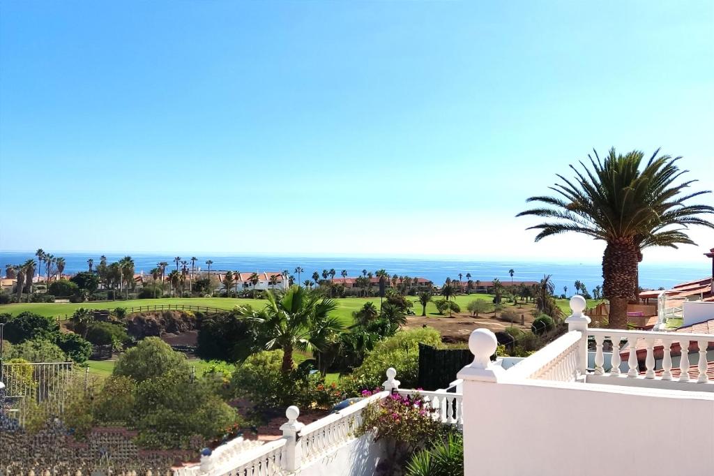 a view of the ocean from the balcony of a villa at La Vista Preciosa in San Miguel de Abona