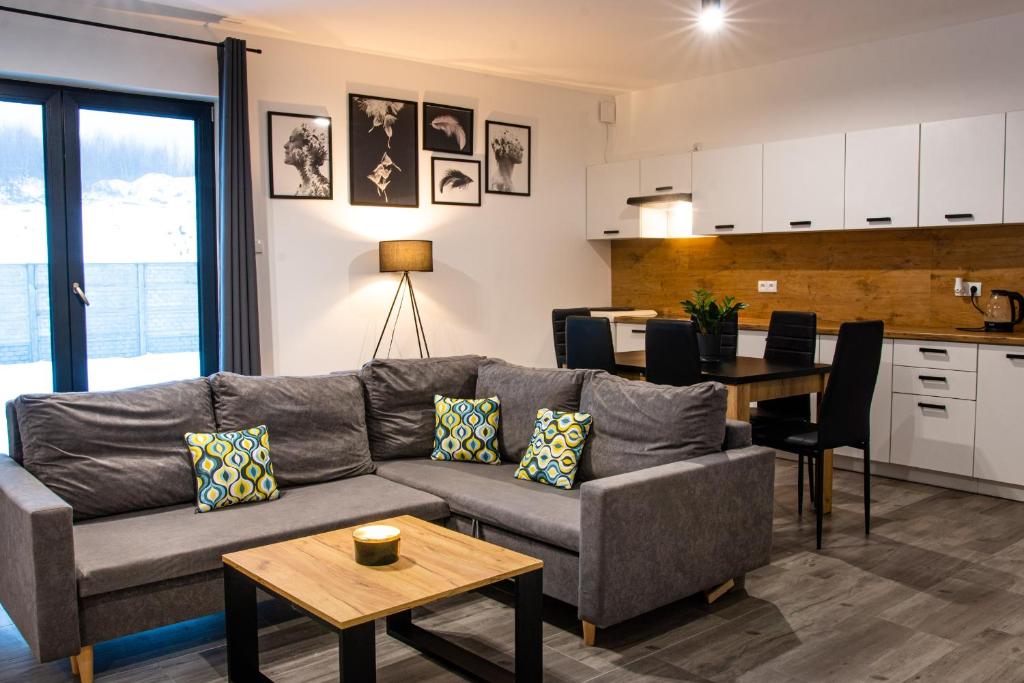 Kuchyň nebo kuchyňský kout v ubytování Osada Słuszewo - Apartamenty Restauracja Wydarzenia