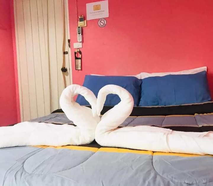 Postel nebo postele na pokoji v ubytování Sea Shell Hut