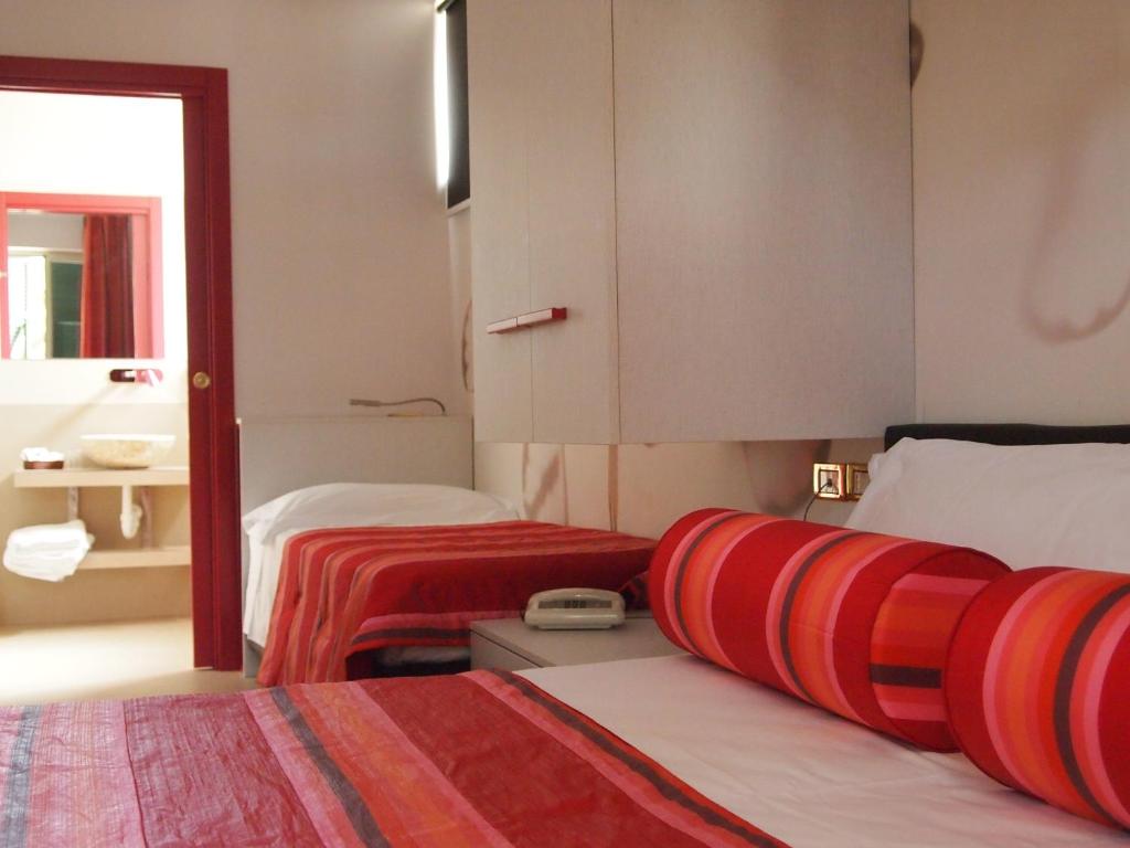 Koupelna v ubytování Piccolo Hotel