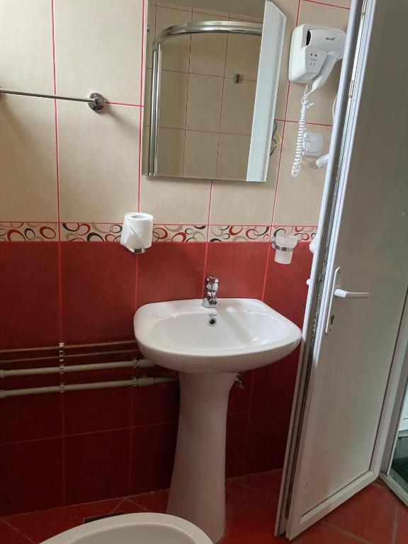 Koupelna v ubytování Apartments Razvršje