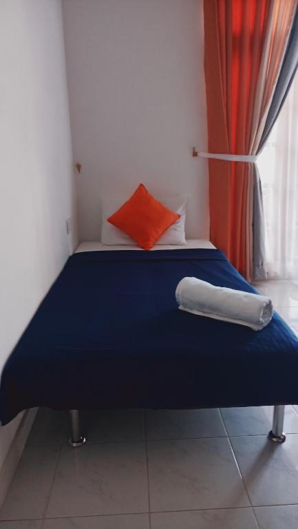 Postel nebo postele na pokoji v ubytování Andorra Tourist Resort Anuradhapura