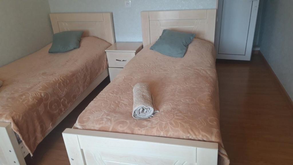 Postel nebo postele na pokoji v ubytování Jeiran Japaridze's Guesthouse