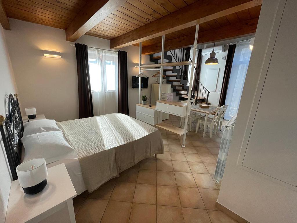 A bed or beds in a room at B&B Sacca