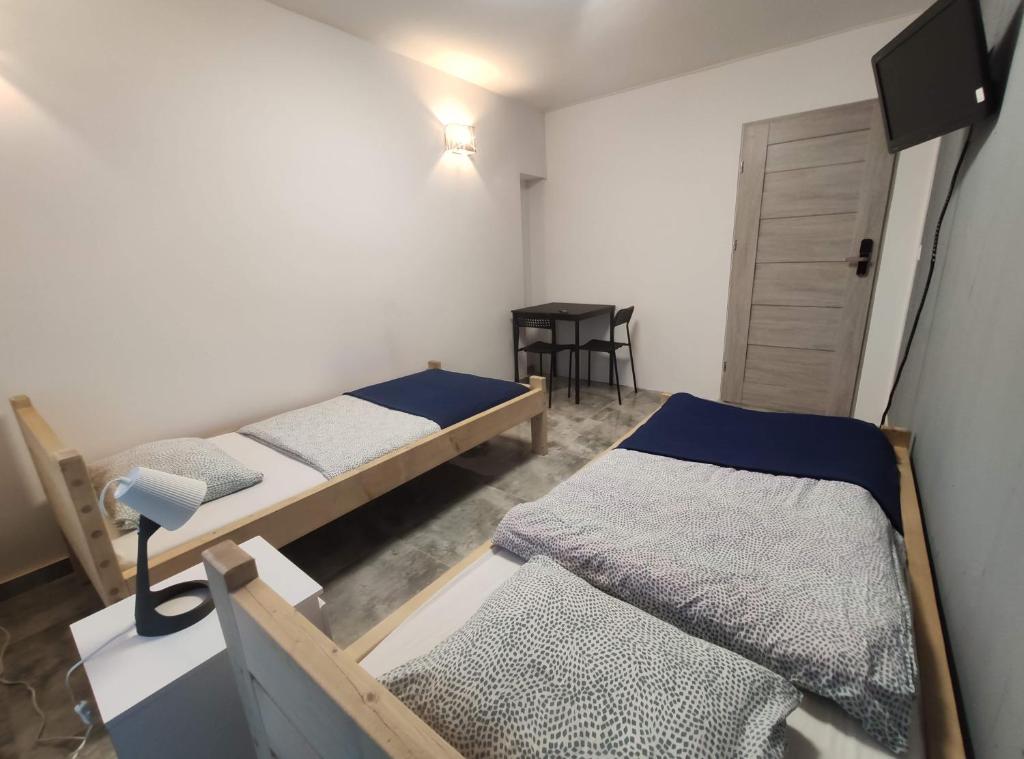 Posteľ alebo postele v izbe v ubytovaní Night Point