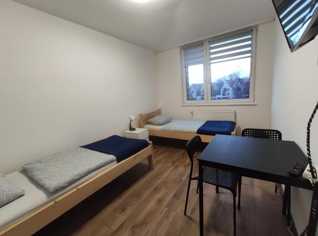 Posteľ alebo postele v izbe v ubytovaní Night Point