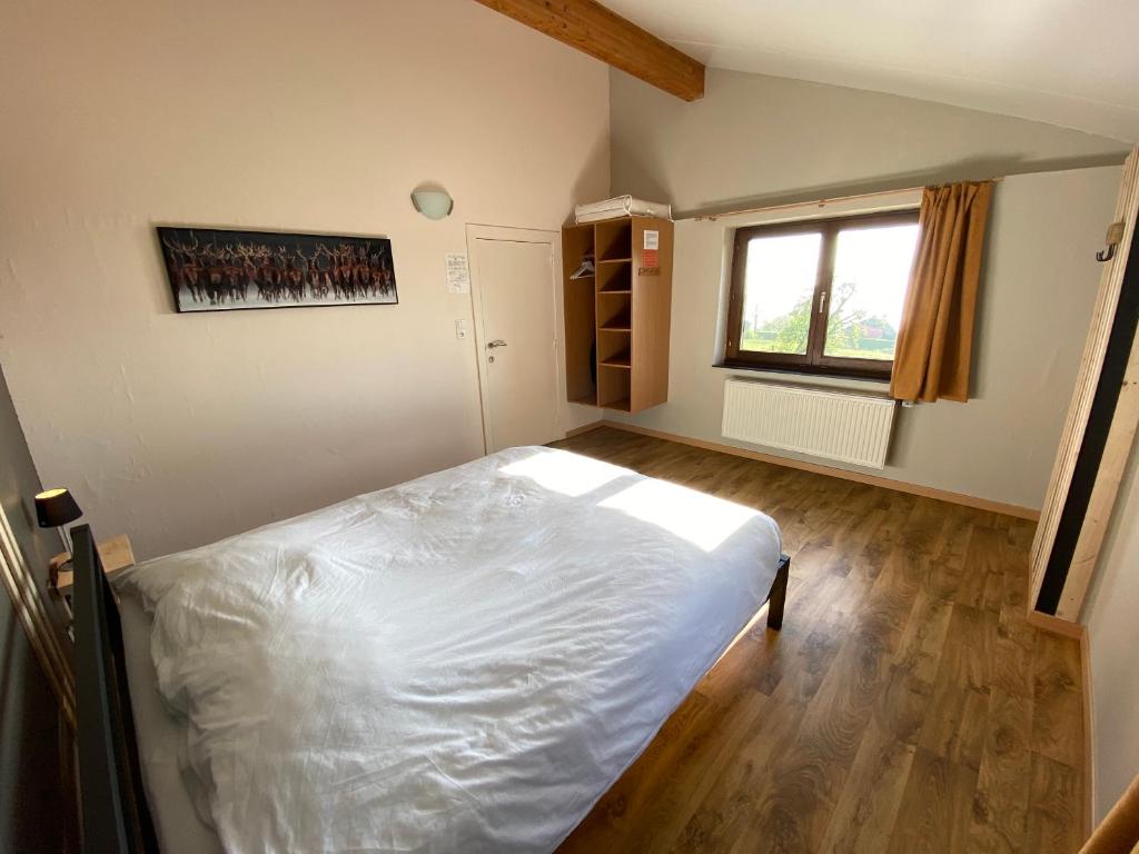 Postel nebo postele na pokoji v ubytování Gite du Moulin Iris