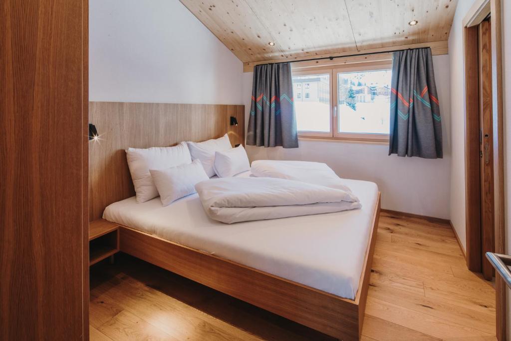 Posteľ alebo postele v izbe v ubytovaní Alpin - Studios & Suites