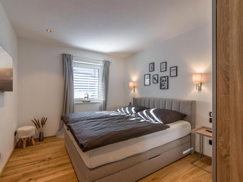 Postel nebo postele na pokoji v ubytování Seereith Apartments