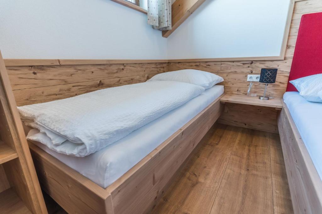 Letto o letti in una camera di d'Genussalm by Alpine Genusswelten