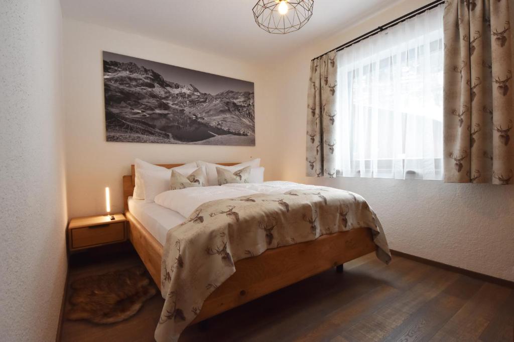 Postel nebo postele na pokoji v ubytování K-Appartements Klösterle
