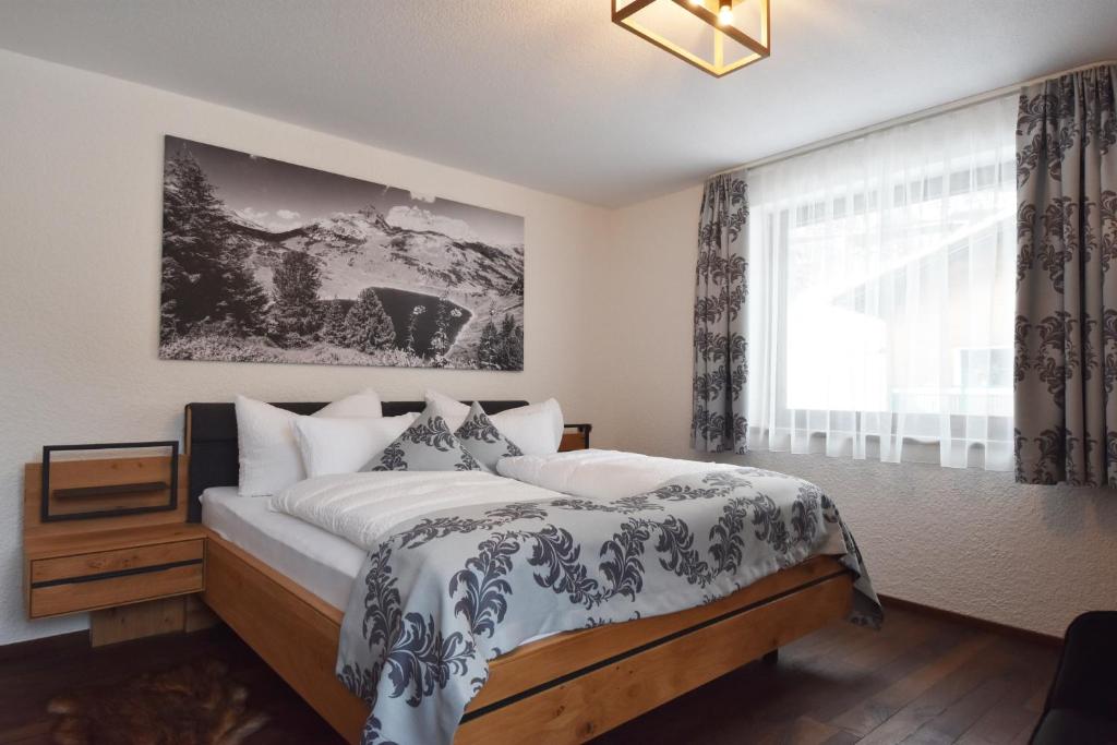 Postel nebo postele na pokoji v ubytování K-Appartements Klösterle